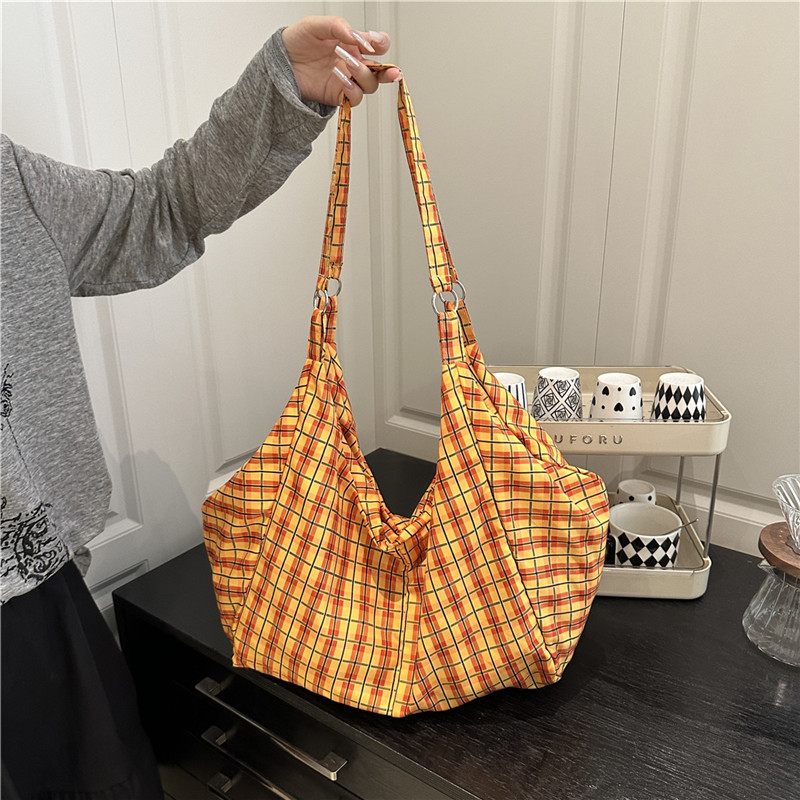 2025 primavera y verano nuevo bolso de tela a cuadros de color bolso de gran capacidad torón de hombro bajo la axila bolso de mujer