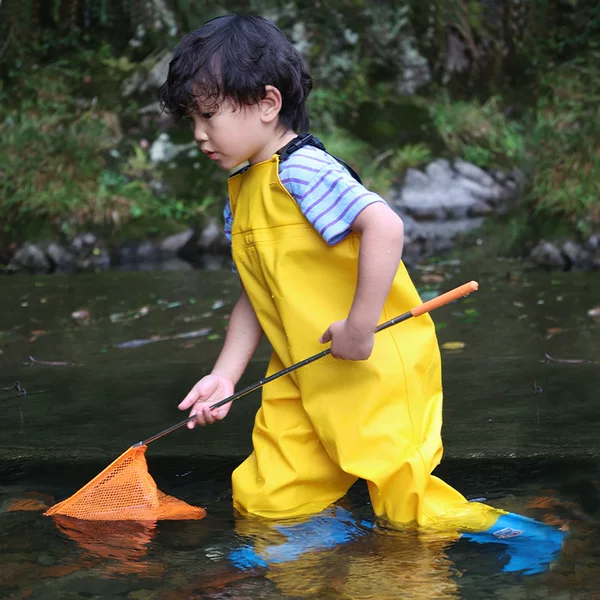 Children's water-playing one-piece water pants kindergarten waterproof clothes catch the sea boys and girls rain boots catch fish rain pants Beach
