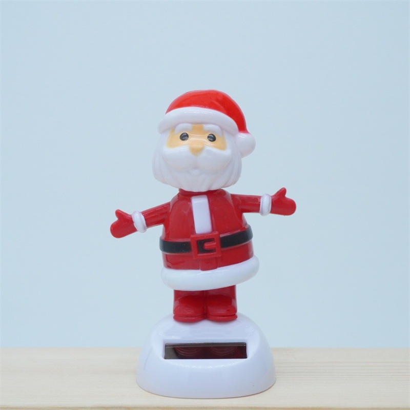 Cross-border Christmas solar energy automatic swing doll car interior shake head decorations creative car car ornaments