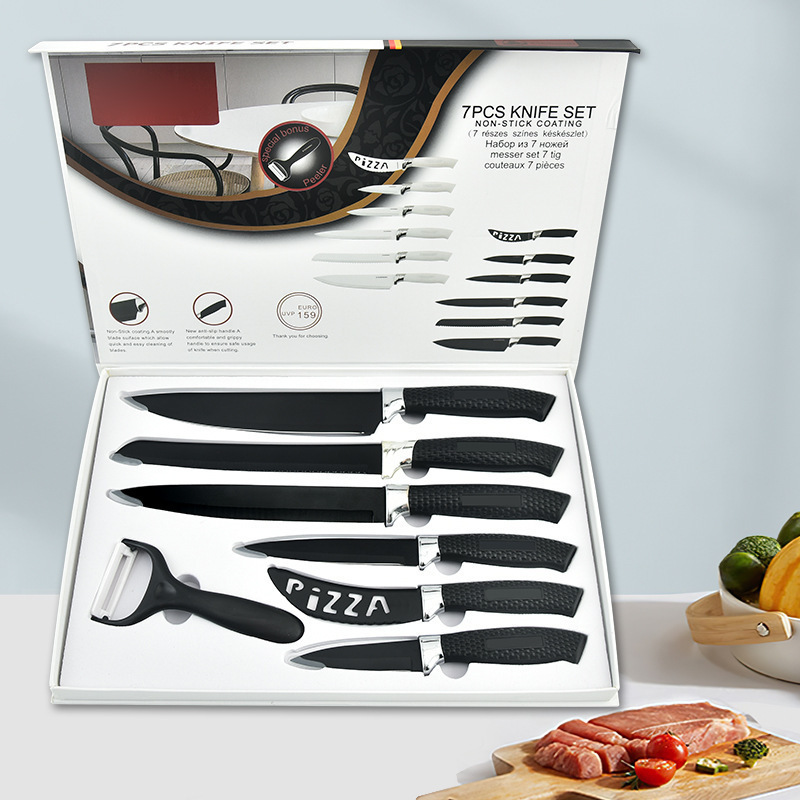 Fábrica en stock mango de malla de siete piezas cuchillo de acero negro cuchillo de queso hueco cuchillo de cocina traje de regalo caja de color