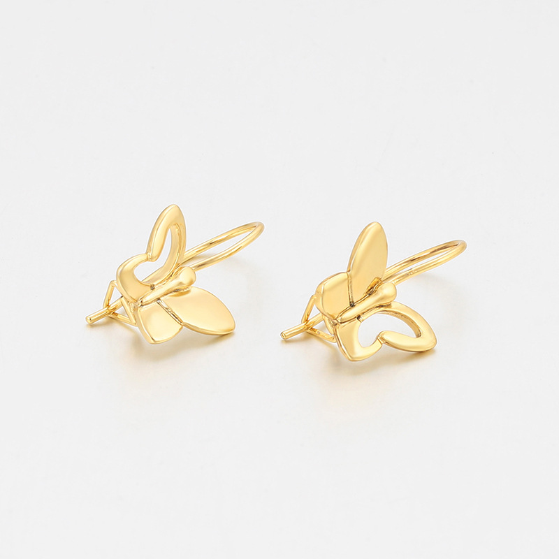 Xuping chapado 14k mariposa gancho de orejas hebilla de aleación de cobre simple Europa y América transfronteriza brillante pendientes de orejas al por mayor mujeres