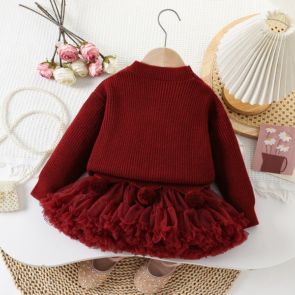 Children's red rainbow sweater with bow