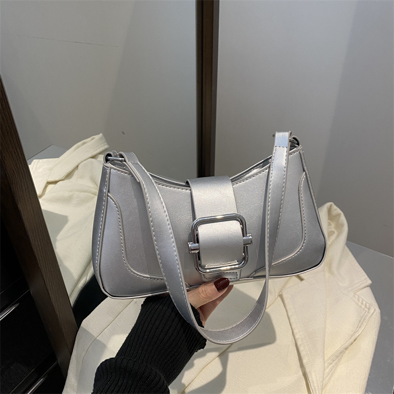 Temperamento simple y elegante bolso de hombro coreano para mujeres 2025, primavera nuevo bolso de brazo universal bolso de mujer coreano