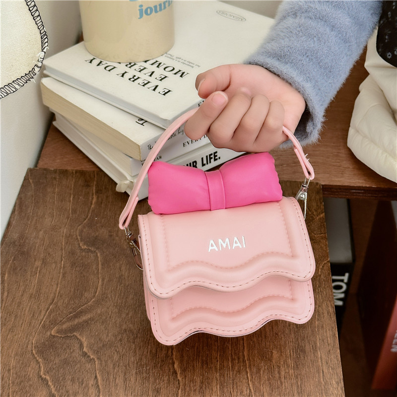 Primavera nuevo estilo coreano mini bolso de hombro de los niños pu arco cadena mensajero bolsa de hombro de las niñas bolsa padre-niño bolsa