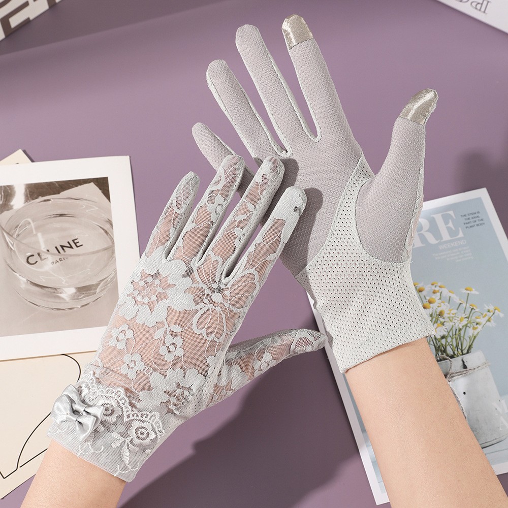 Nuevos guantes de protección solar para mujer primavera y verano al aire libre pantalla táctil encaje antideslizante arco fábrica al por mayor