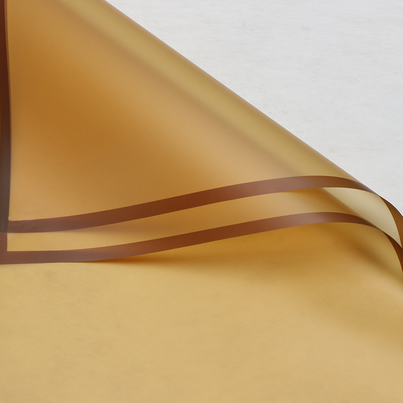 Roland New Golden frontera jalea película de la flor material de papel de embalaje impermeable de gama alta Flor de papel de embalaje ramo de flores tienda de flores