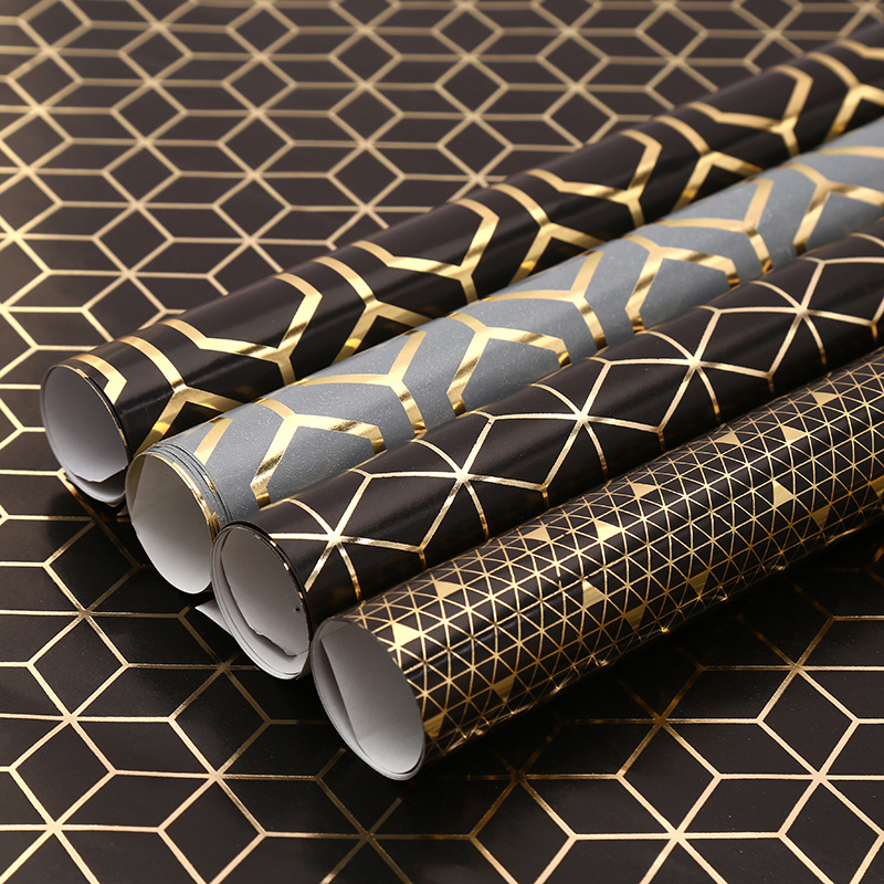 Papel de regalo serie geométrica dorado papel de embalaje engrosado papel recubierto caja de regalo de vacaciones embalaje papel de seda al por mayor