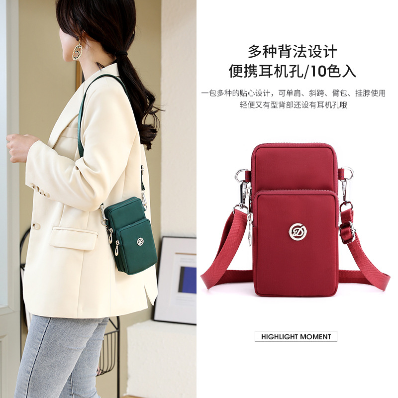 Bolsa de teléfono móvil al por mayor transfronteriza bolsa de mensajero de las mujeres Mini bolsa pequeña bolsa de muñeca bolsa de teléfono móvil Halter monedero tela