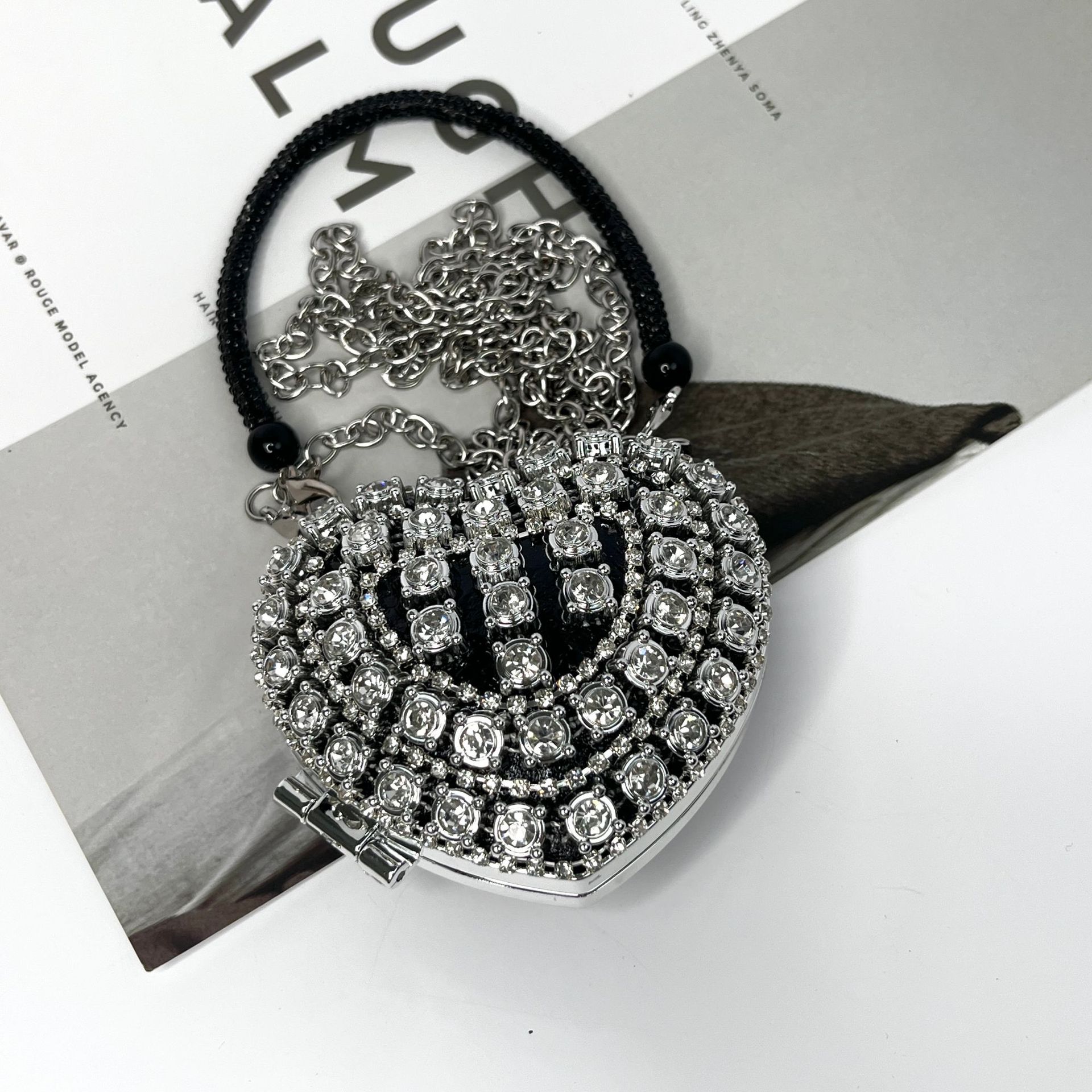 Black vertical triangle diamond love handbag