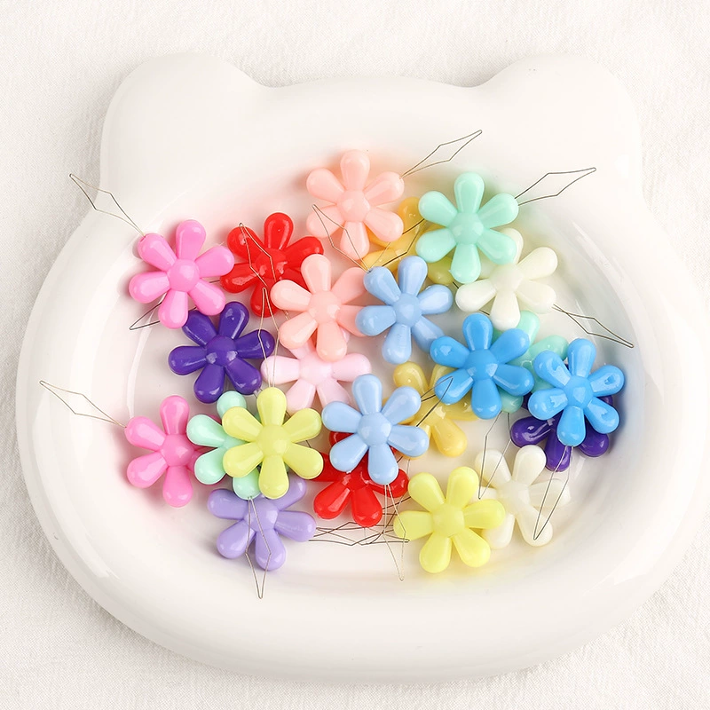 Конфеты цвета сливы в форме иглы