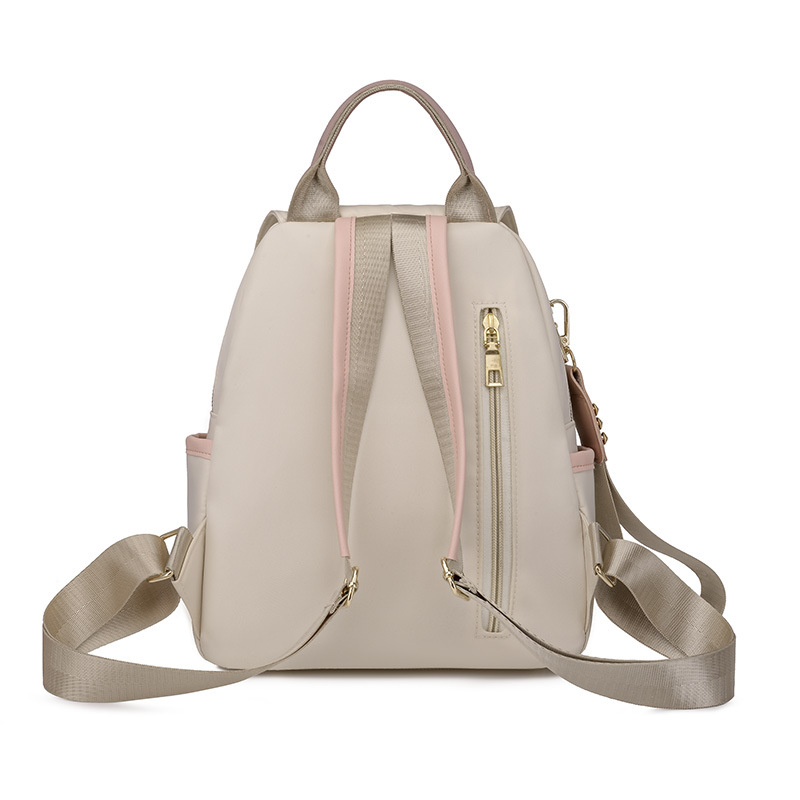 Bolsos mujer 2023 nueva mochila antirrobo coreana moda femenina todo fósforo nicho color de contraste mochila de viaje al por mayor