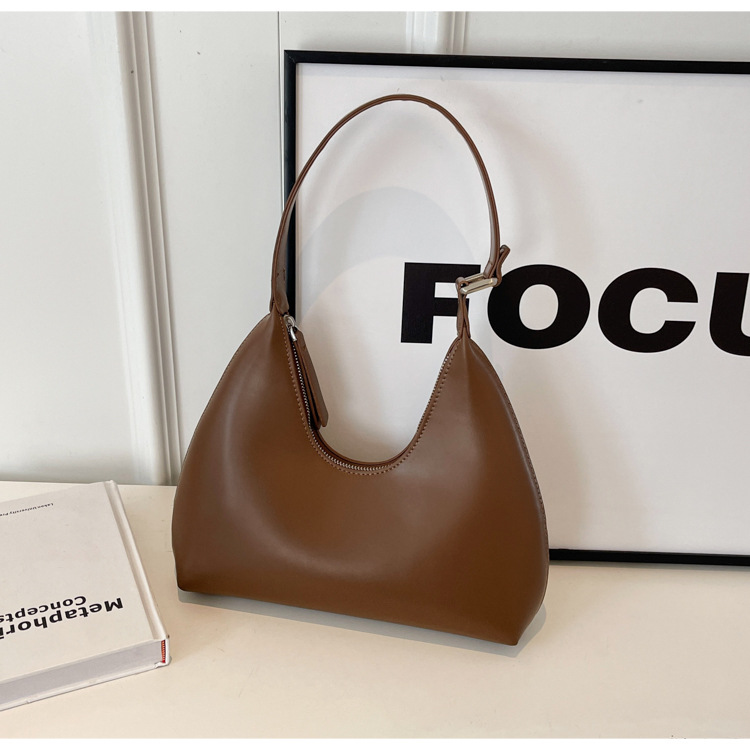 Sotto le ascelle da donna 2024 nuovo modello minimalista a mezzaluna con temperamento versatile, viaggio casual, consistenza portatile,_voghion.com