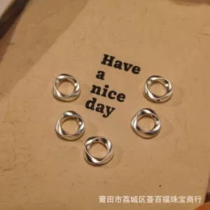 Pure silver s999 Möbius 3D hard silver accessory, hollow fashion niche light luxury ins handmade silver spacer bead accessory