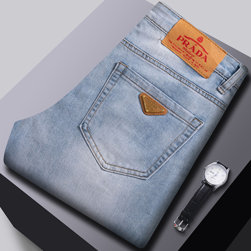 Primavera nuevos jeans para hombres coreanos delgados pies pequeños comercio exterior transfronterizo de alta calidad elástico Europa y los Estados Unidos 1: 1 pantalones al por mayor