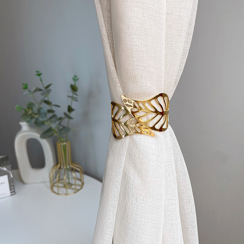 Manufacturer's new light luxury curtain straps metal spring hollow leaf curtain buckle household curtain clip wholesale