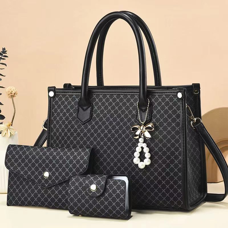2026 nueva tendencia transfronteriza tres piezas paquete de bolsas para niños y madres, bolsas de mano portátiles de hombro simple y de gran capacidad