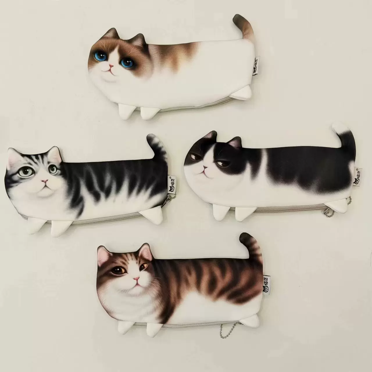 仿真猫咪脸笔袋耳机收纳袋创意猫星人收纳袋文具袋卡包零钱包现货