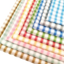 厂家现货涤棉牛津纺格子面料色织布里子布箱包鞋帽里料现货供应