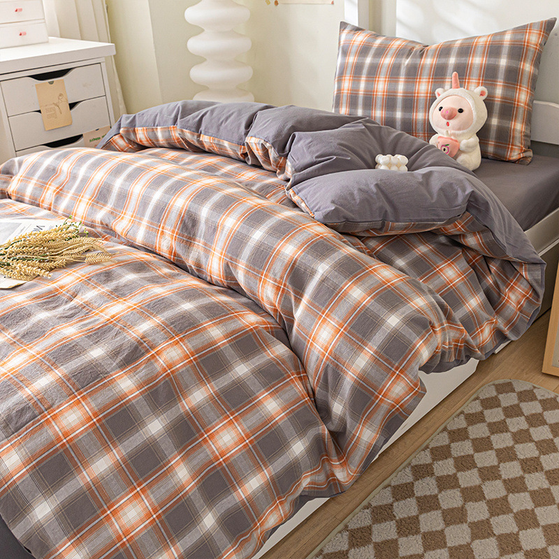 Verano dormitorio universitario conjunto de algodón de tres piezas 2025 nuevo estilo funda de edredón de algodón sábana cama de cuatro piezas ropa de cama
