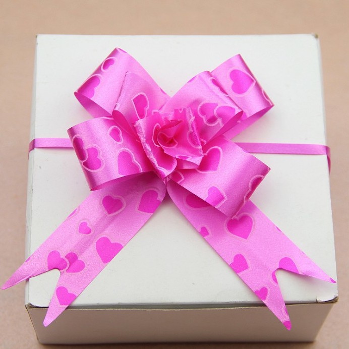 Fabricante al por mayor de empaques de flores para regalos navideños, cinta con borde dorado, 30 flores medianas atadas a mano.