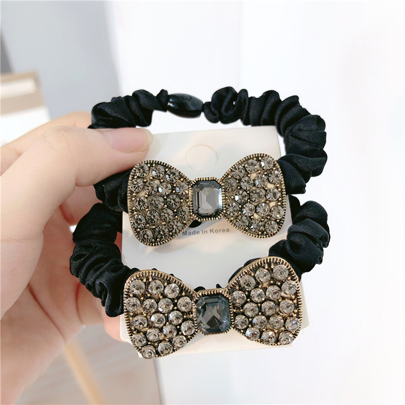 Corea del Sur Dongdaemun moda retro arco cristal diamante lleno banda de pelo cuerda de pelo francés intestino grueso anillo cabeza cuerda banda de goma