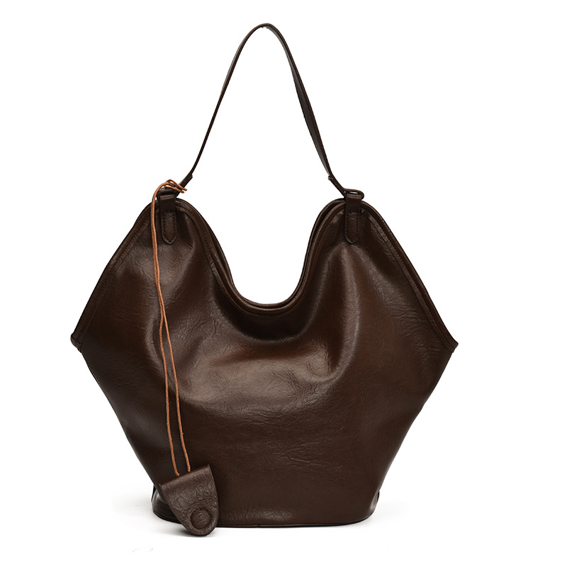 Bolsa de cubo transfronteriza de gran capacidad, bolsa de viaje retro de mujer 2025, otoño y invierno, nueva moda, bolsa de brazo, bolsa de hombro universal