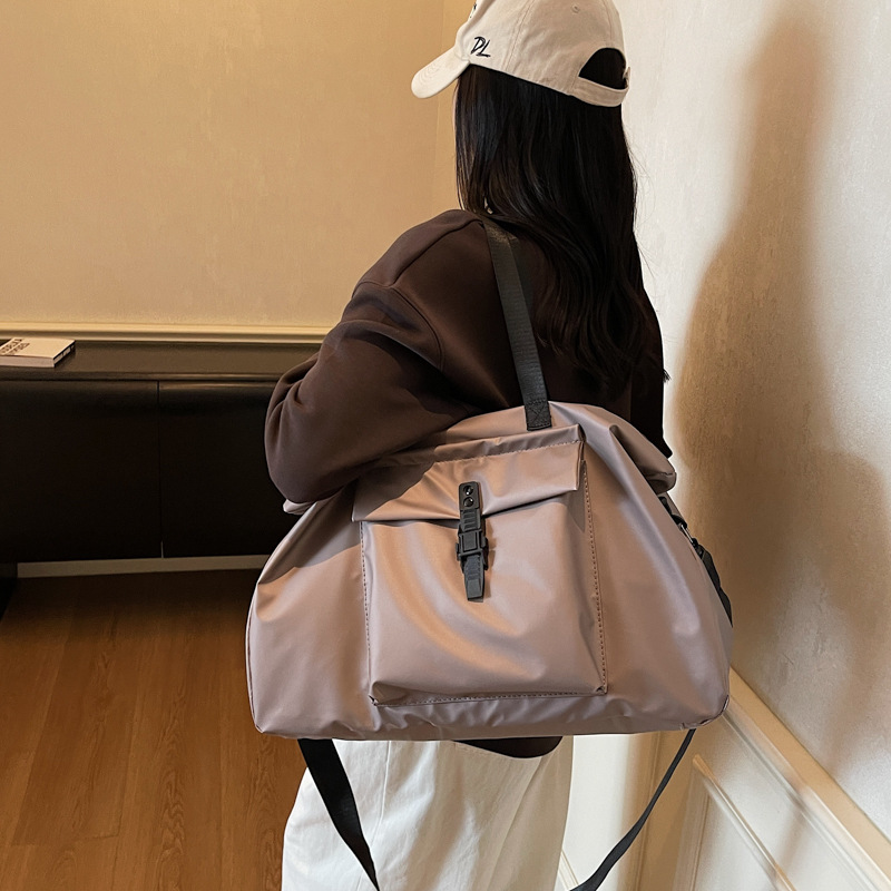 Bolsa de viaje transfronteriza de gran capacidad para mujeres nueva bolsa de almacenamiento portátil deportivo de acondicionamiento físico bolsa de viaje de negocios