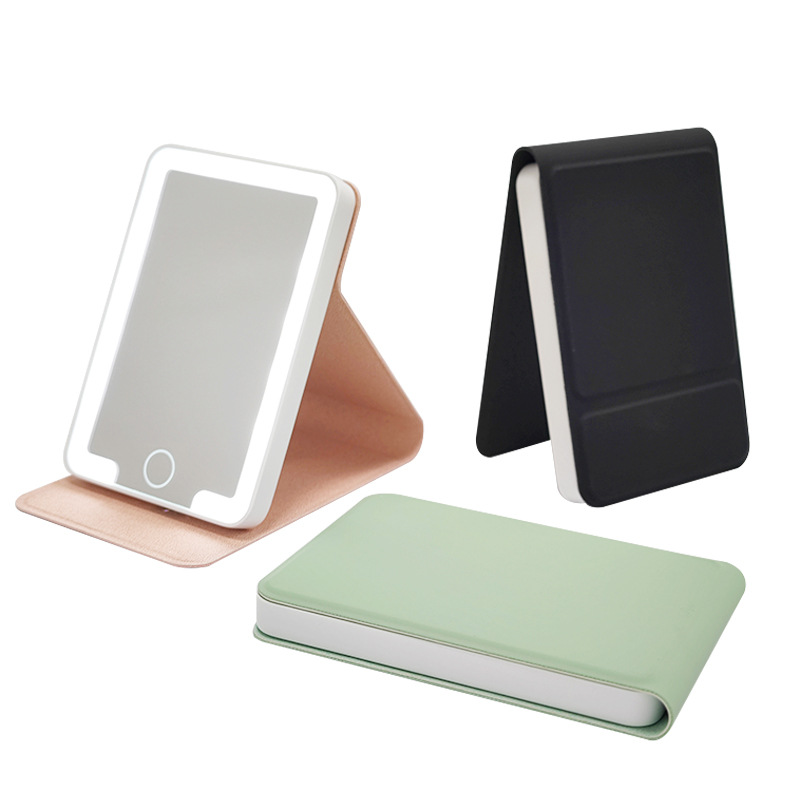 Mini espejo plano plegable de cuero impermeable transfronterizo con luz pequeña tapa abatible portátil portátil LED espejo de maquillaje de mano
