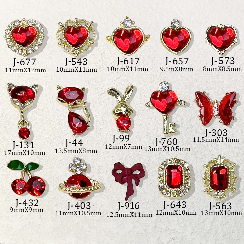 2023 Nueva joyería de uñas Año nuevo rojo aleación conejo rojo mariposa de cristal pintura en aerosol arco accesorios de diamantes de uñas