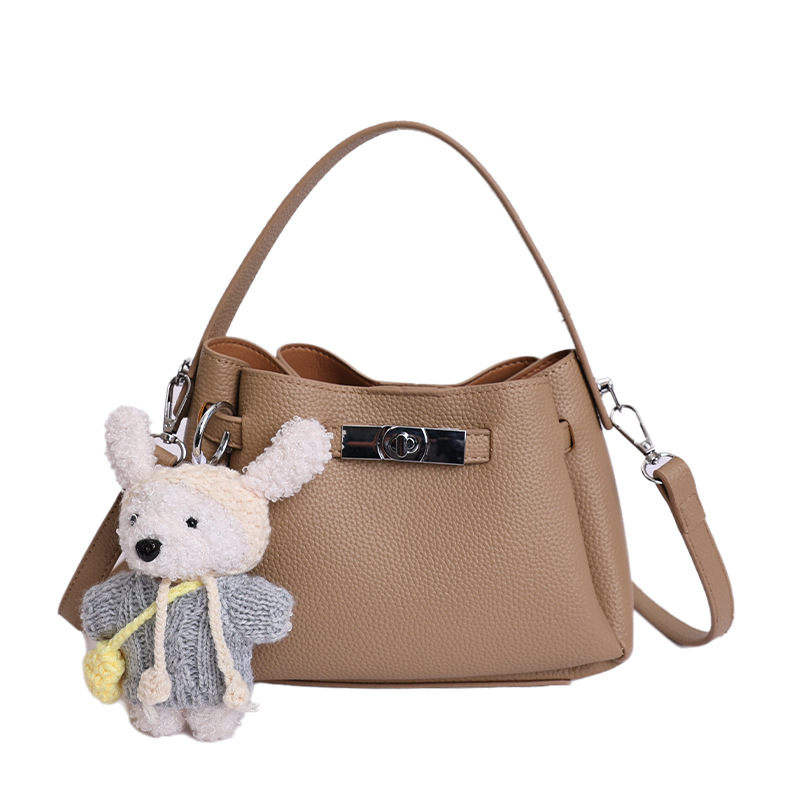 Coreano de nicho de alta calidad canasta de verduras, bolso de cubo de mano para mujeres 2026 nuevo estilo extranjero, lujo ligero y versátil bolso de mochila