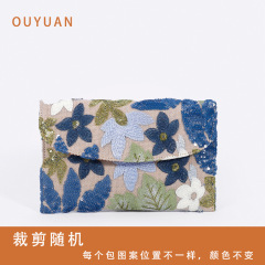 クロスボーダー高級感のある封筒にスパンコール刺繍草編みの女性がバッグを持っています。