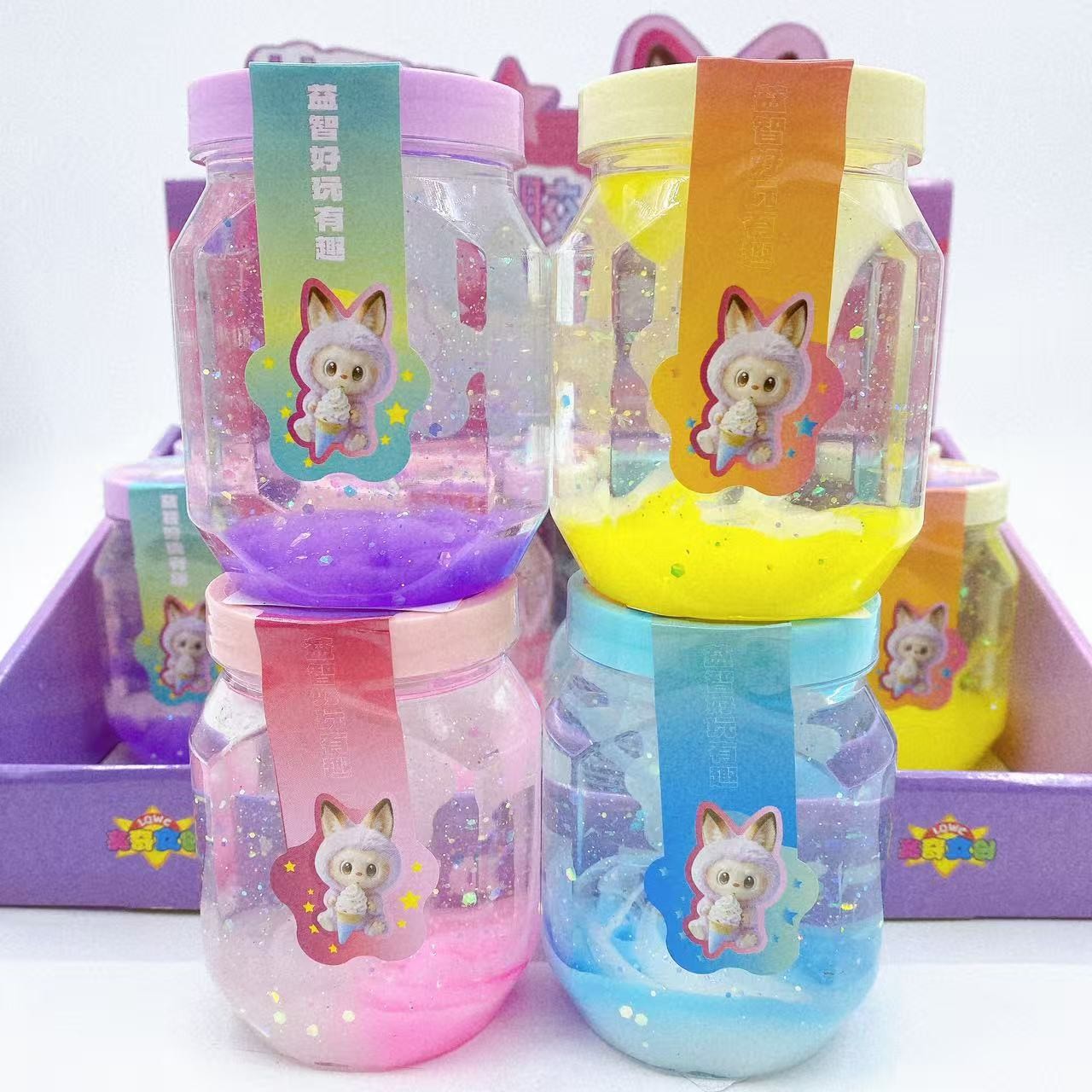 Lodo de dibujos animados de lápido colorido transparente de alta transparencia precio de subida Slime DIY hecho a mano material descomprimido lote de juguetes
