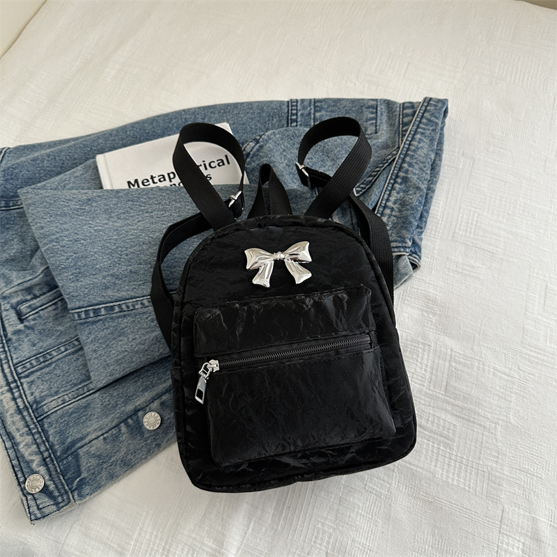 Mochila de arco para mujeres, estilo de estilo casual, moda coreana, mochila de balde, mochila de viaje pequeña y ligera