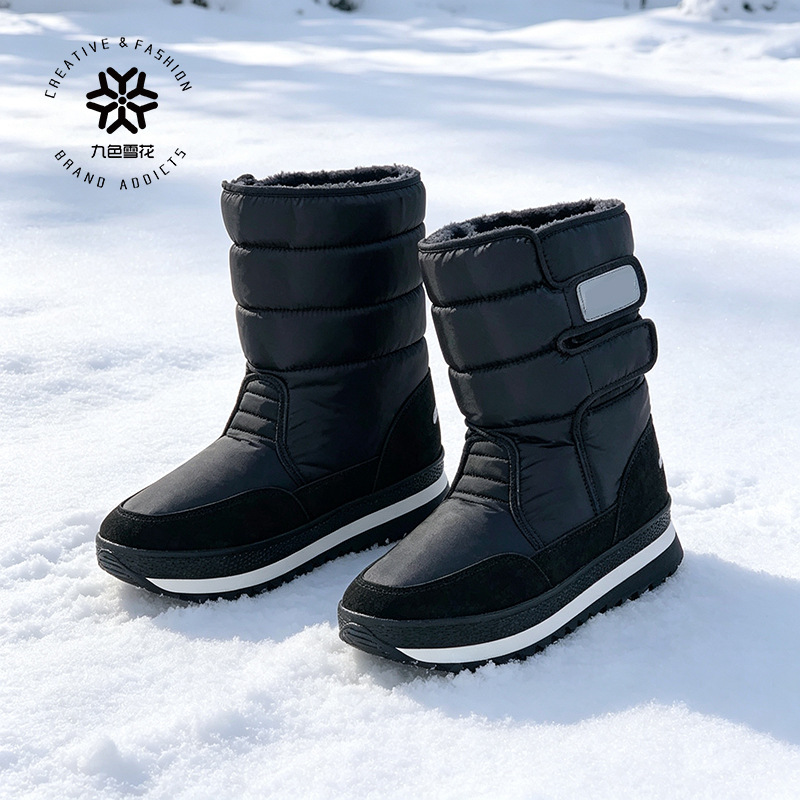 Botas de nieve unisex negras de caña alta al por mayor del fabricante, fáciles de poner y quitar, con forro de piel largo, antideslizantes y cálidas. image 1
