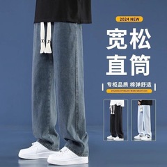 流行のジーパンの春と秋のタイプの男子学生はゆったりしています。