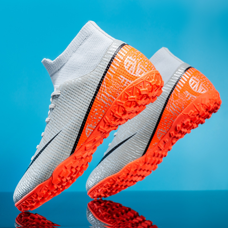 Zapatos de fútbol de caña alta transfronterizos, hombres y mujeres, niños, clavos rotos en césped artificial, zapatos de entrenamiento de competición para estudiantes con clavos largos 2398