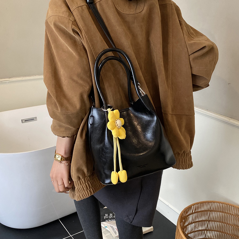 Nicho Zhong canasta de verduras de alto nivel, bolso de cubo, mujer 2025 nuevo retro bolso de trabajo, mochila de viaje