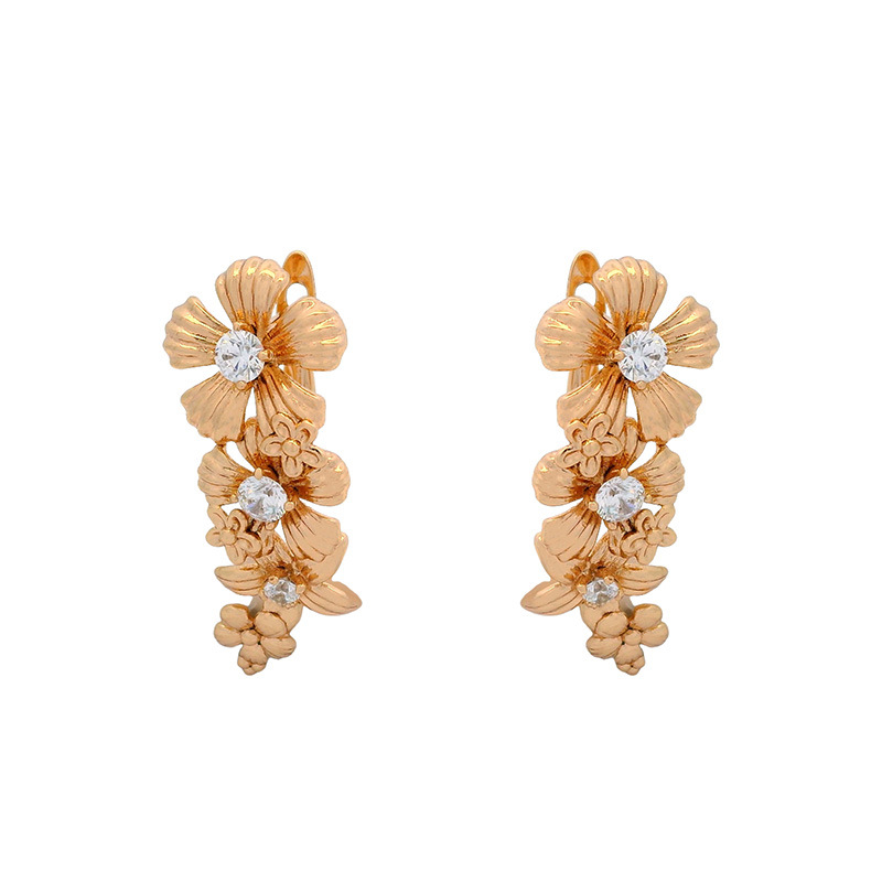 Nuevos pendientes de clip con forma de flor y piedras artificiales de aleación electrochapada en color oro de 18k de Xuping, diseño exclusivo, elegantes y con estilo.