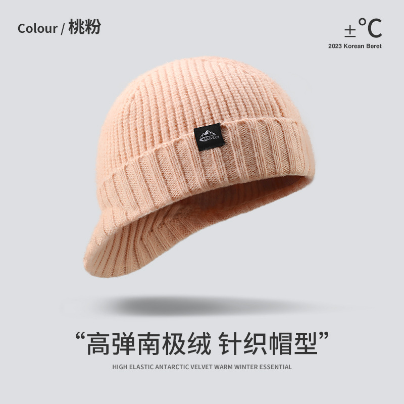 Sombrero de punto simple de moda para hombres y mujeres otoño e invierno 45% lana cálido sombrero frío a prueba de viento protección del oído sombrero de lana anti-Pilling
