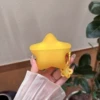 Светящаяся жёлтая звезда, с подвеской