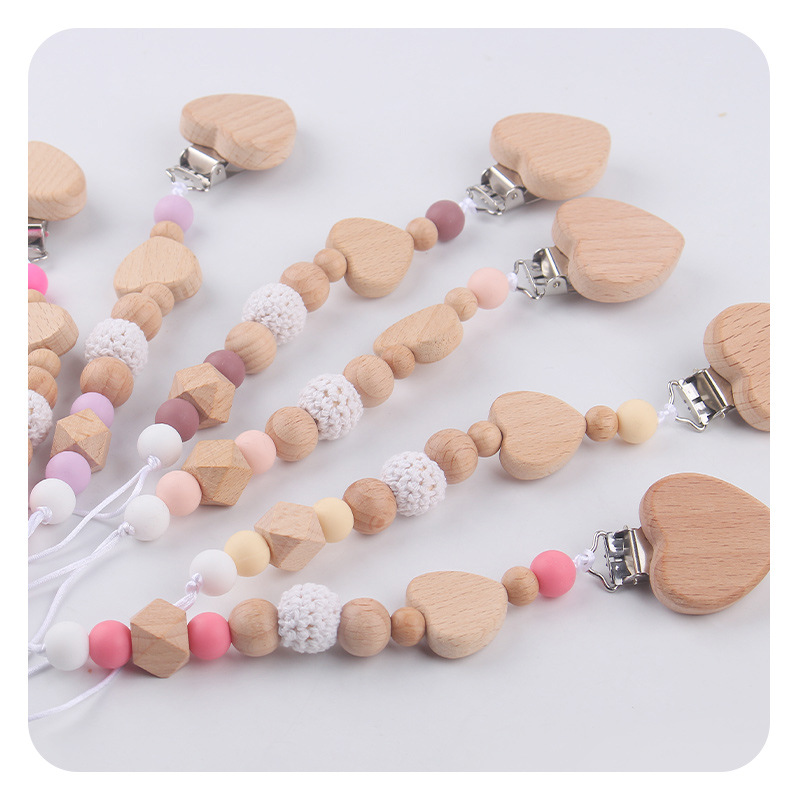 Productos para bebés y niños pequeños clip de tetina creativo caricatura bebé amor de beech mordida de dientes molares tetina cadena de prevención