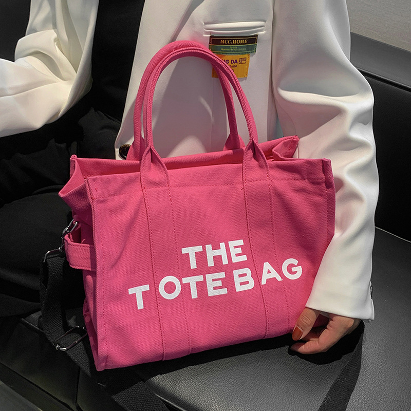 Bolso de mano para mujer, nuevo bolso práctico de lona con nudo transfronterizo, de gran capacidad, adecuado para el trabajo y los desplazamientos, se puede llevar como bolso de hombro o bandolera.