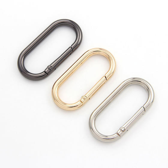 Denier-shaped spring ring runway ring open egg-shaped oval spring buckle luggage clothing hardware accessories wholesale
