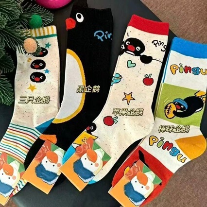 Women's socks with high aesthetic appeal, versatile mid-calf length, cute penguin design, ins cartoon style, sweet and suitable for outer wear, long socks with little penguins Women's socks with high aesthetic appeal, versatile mid-calf length, cute penguin design, ins cartoon style, sweet and suitable for outer wear, long socks with little penguins