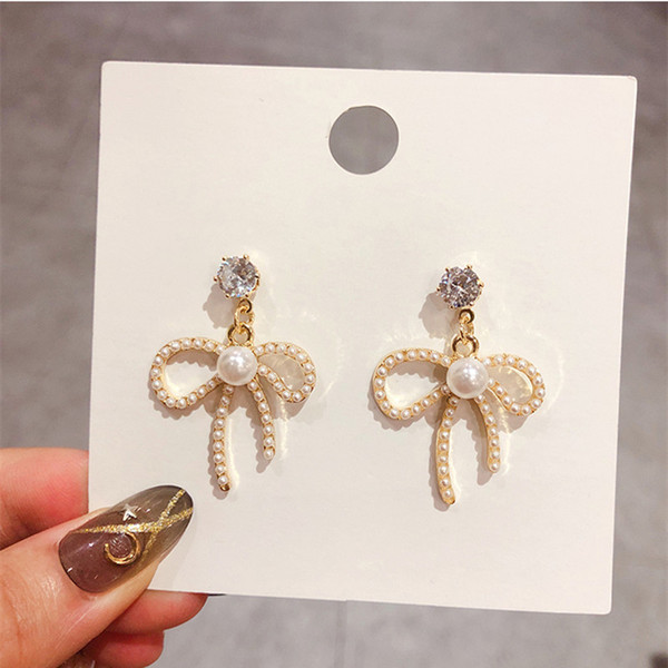 Fashionable cute retro earrings with bow with zircon from pearl