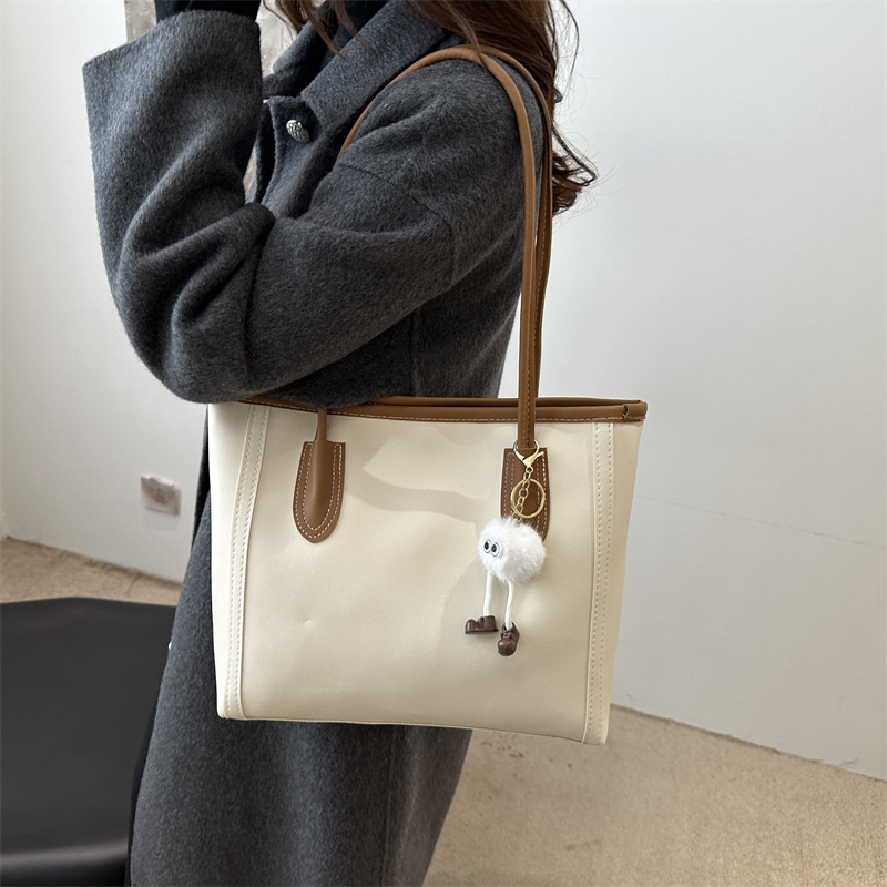 Bolsa axillar de gran capacidad para mujeres 2024 nueva moda otoño invierno sensación de bolso de hombro para estudiantes casuales bolso de clase