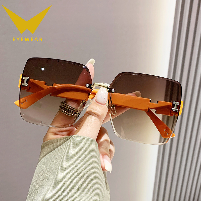 2023 new frameless two-color gradient High sense women's fashion driving sunglasses fashion sunglasses wholesale factory