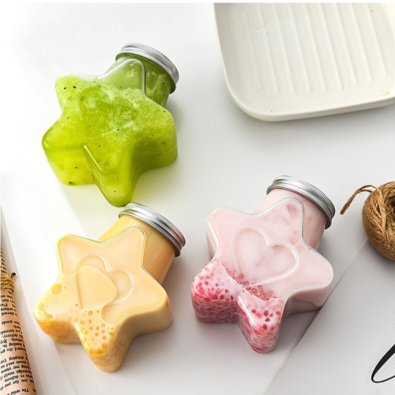 Wholesale Internet Celebrity Milk Tea Cup Disposable Sealed Star Bottle with Lid Creative Wide Mouth Juice Bottle Food Grade Beverage Bottle Wholesale Internet Celebrity Milk Tea Cup Disposable Sealed Star Bottle with Lid Creative Wide Mouth Juice Bottle Food Grade Beverage Bottle