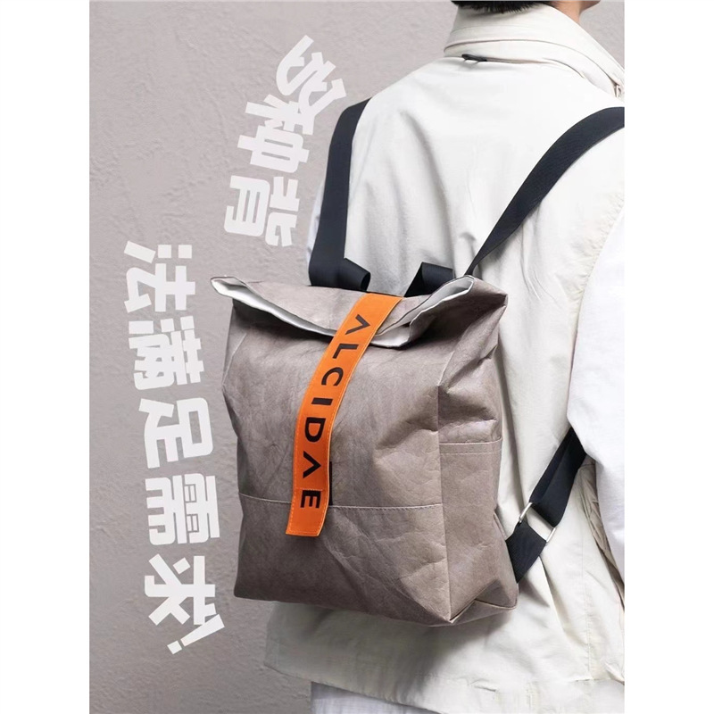 杜邦纸袋定 制可印刷logo图案斜挎手提袋帆布内衬纯色电脑公文包