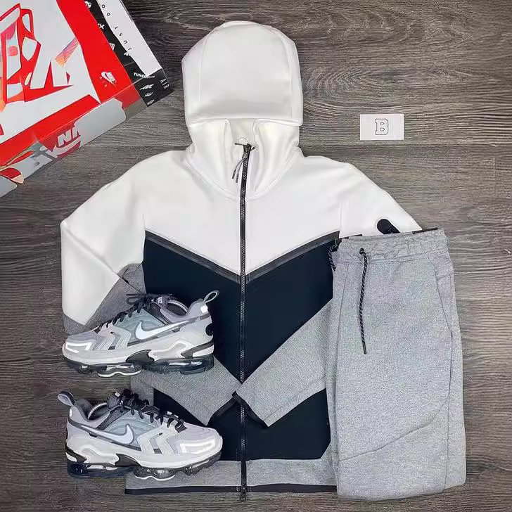 Trajes deportivos para hombres de venta caliente de Amazon transfronterizo en Europa y América Primavera y otoño nuevos pantalones de ropa deportiva con capucha Trajes casuales